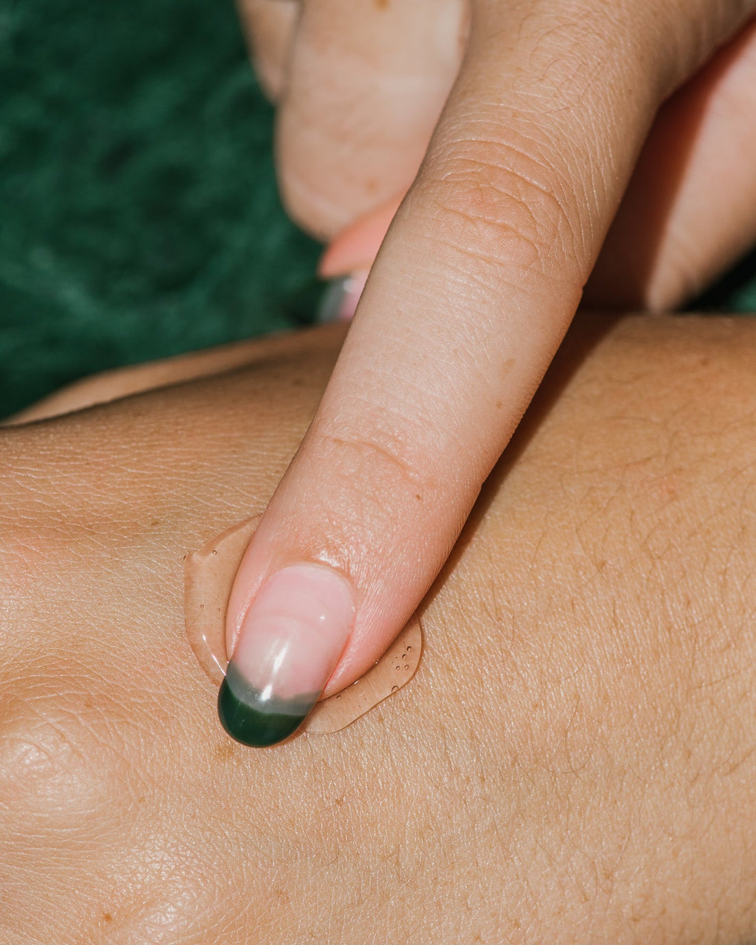 Close up of Detox Tightening Mask on skin.