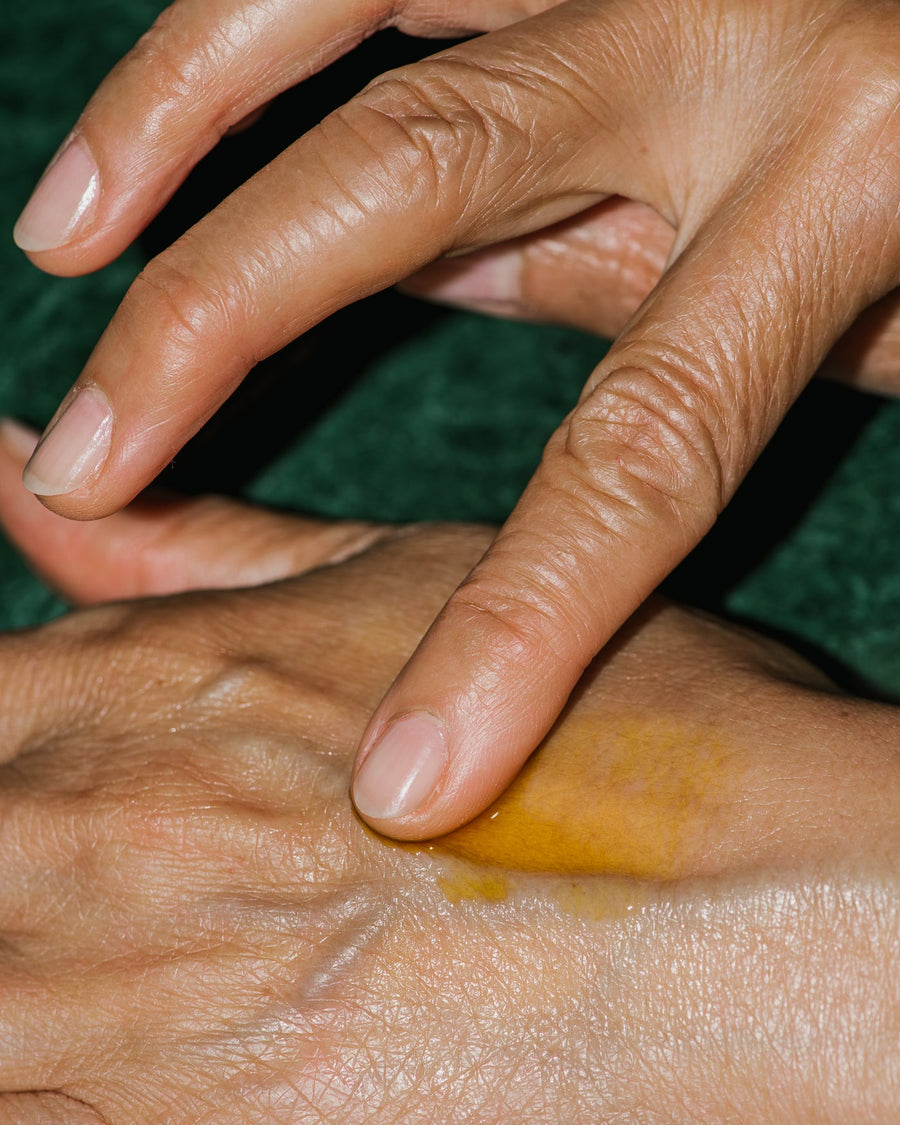 Close up of All-Embracing Serum on hand.