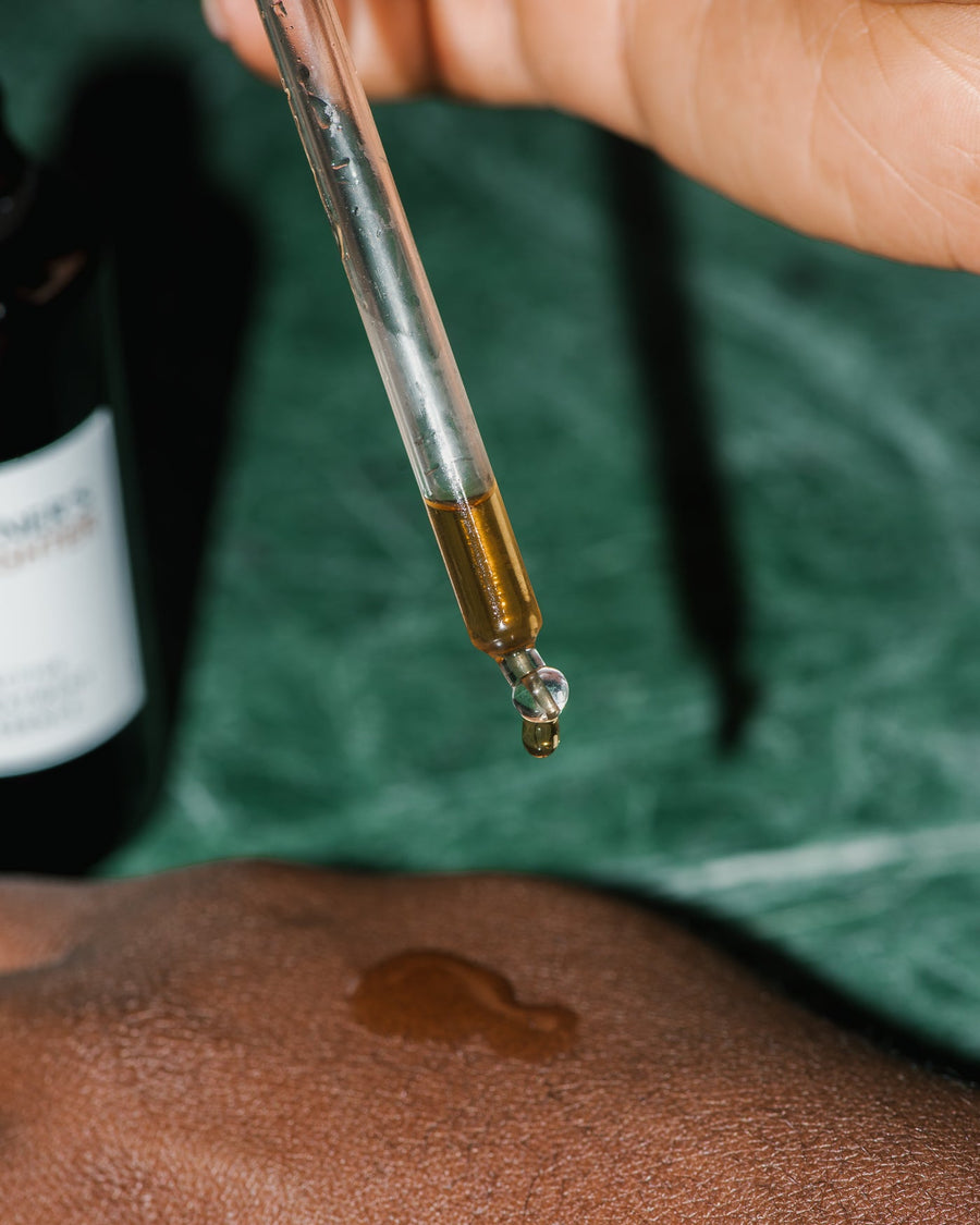 Close up of Active Treatment Essence on skin.